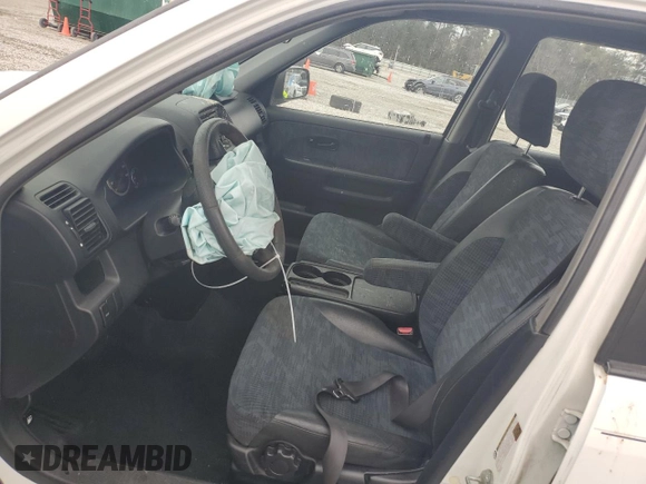 2004 Honda CR-V LX with VIN SHSRD68434U205205, listed as a Copart auction lot 50465065 with 113,312 mi miles and Salvage Title. Bid and sale history available at DreamBid. Image 7.