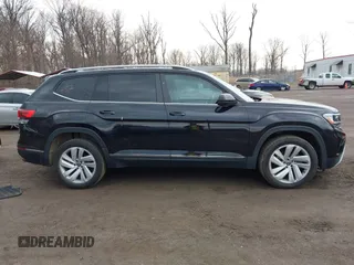 2021 Volkswagen Atlas SEL z VIN 1V2BR2CA6MC502917, wystawiony jako IAAI lot #41681068 z przebiegiem 49 994 mil mil oraz . Historia ofert i sprzedaży dostępna na DreamBid. Obrazek 13.