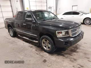 2008 Dodge Dakota Laramie z VIN 1D7HW58N38S534565, wystawiony jako IAAI lot #42278869 z przebiegiem 155 327 mil mil oraz . Historia ofert i sprzedaży dostępna na DreamBid. Obrazek 1.