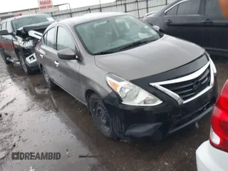 2015 Nissan Versa SV with VIN 3N1CN7AP0FL881056, listed as a IAAI auction lot 42106423 with 134,760 mi miles. Bid and sale history available at carsss.com. Image 1.