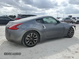 2013 Nissan 370Z with VIN JN1AZ4EH7DM880230, listed as a Copart auction lot 78398894 with 130,871 mi miles and Salvage Title. Bid and sale history available at carsss.com. Image 3.