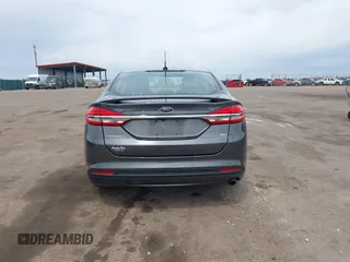 2017 Ford Fusion SE z VIN 3FA6P0H76HR354078, wystawiony jako IAAI lot #42103550 z przebiegiem 103 201 mil mil oraz . Historia ofert i sprzedaży dostępna na DreamBid. Obrazek 16.