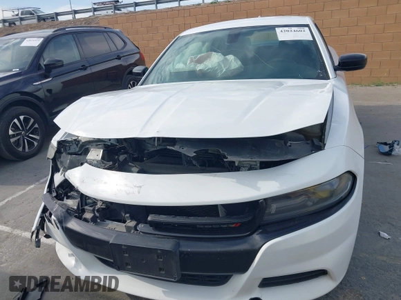 2018 Dodge Charger SXT Plus with VIN 2C3CDXHG4JH187580, listed as a IAAI auction lot 42024602 with 203,843 mi miles and . Bid and sale history available at carsss.com. Image 6.