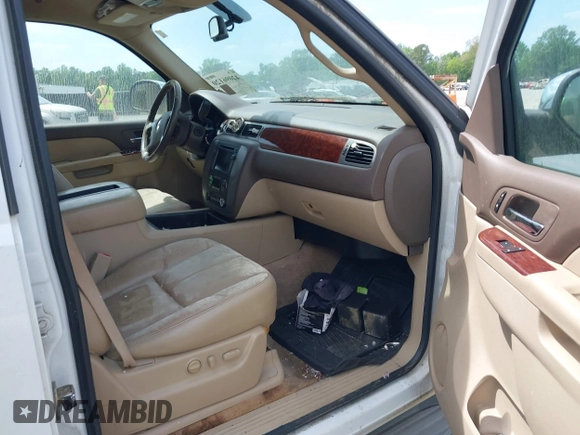 2011 GMC Yukon SLT with VIN 1GKS1CE0XBR156954, listed as a IAAI auction lot 42096120 with 288,142 mi miles. Bid and sale history available at carsss.com. Image 5.
