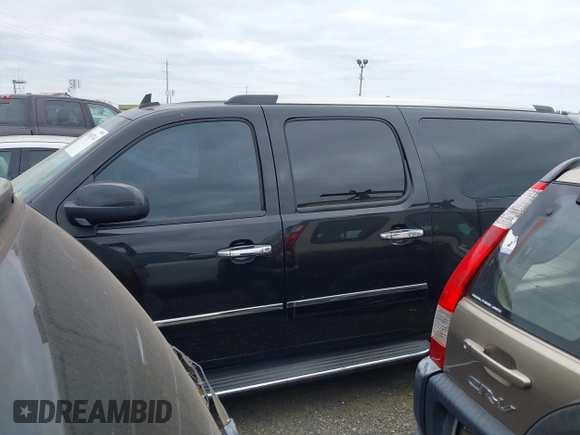 2012 GMC Yukon XL Denali with VIN 1GKS2MEFXCR276620, listed as a IAAI auction lot 41910714 with 266,800 mi miles. Bid and sale history available at carsss.com. Image 14.