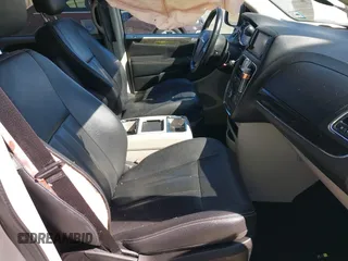 2013 Chrysler Town & Country Touring with VIN 2C4RC1BG9DR777819, listed as a IAAI auction lot 41824692 with 138,702 mi miles. Bid and sale history available at carsss.com. Image 5.