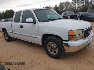 2001 GMC Sierra 1500 SLE z VIN 2GTEC19V811287479, wystawiony jako IAAI lot #41750502 z przebiegiem 310 344 mil mil oraz . Historia ofert i sprzedaży dostępna na DreamBid. Obrazek 1.