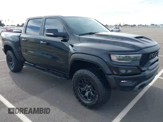 2021 Ram 1500 TRX with VIN 1C6SRFU98MN703355, listed as a IAAI auction lot 40913103 with 27,200 mi miles. Bid and sale history available at carsss.com. Image 1.