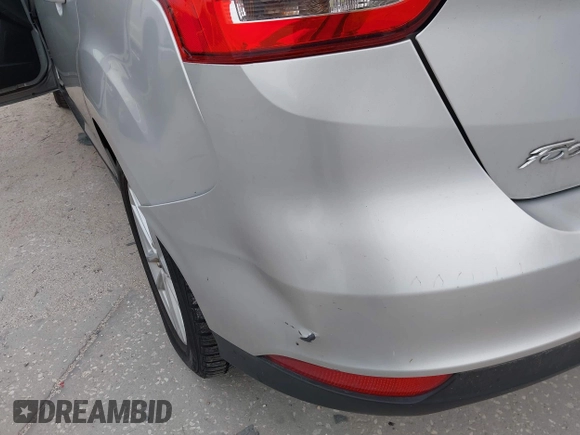 2015 Ford Focus SE with VIN 1FADP3K25FL328797, listed as a IAAI auction lot 41328404 with 72,368 mi miles. Bid and sale history available at carsss.com. Image 13.