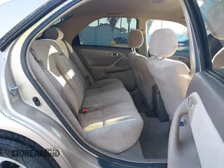 1999 Toyota Camry LE z VIN 4T1BF28K3XU931485, wystawiony jako IAAI lot #41413709 z przebiegiem 148 621 mil mil oraz . Historia ofert i sprzedaży dostępna na DreamBid. Obrazek 8.