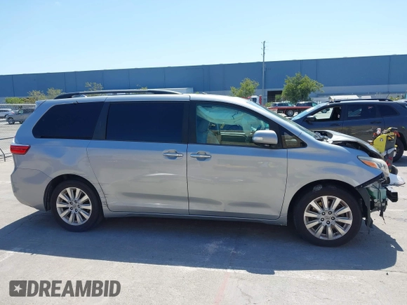 2015 Toyota Sienna XLE with VIN 5TDYK3DC5FS594514, listed as a IAAI auction lot 42183673 with 120,978 mi miles and . Bid and sale history available at DreamBid. Image 13.