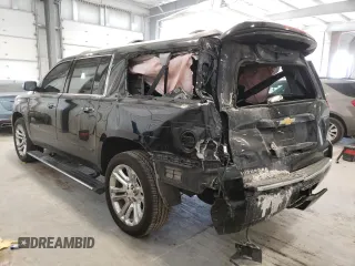 2019 Chevrolet Suburban Premier with VIN 1GNSKJKJ8KR302849, listed as a Copart auction lot 87717275 with 69,498 mi miles and Salvage Title. Bid and sale history available at DreamBid. Image 2.
