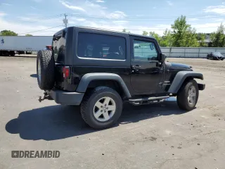 2014 Jeep Wrangler Sport with VIN 1C4AJWAG2EL113843, listed as a Copart auction lot 62771115 with 70,089 mi miles and Salvage title. Bid and sale history available at DreamBid. Image 3.