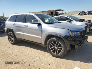 2018 Jeep Grand Cherokee Altitude with VIN 1C4RJEAG8JC512425, listed as a Copart auction lot 51838895 with 68,375 mi miles and Salvage title. Bid and sale history available at DreamBid. Image 4.