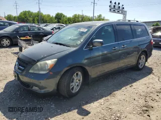 2006 Honda Odyssey Touring z VIN 5FNRL38876B123895, wystawiony jako Copart lot #56414355 z przebiegiem 248 142 mil mil oraz Szkoda całkowita • Salvage title. Historia ofert i sprzedaży dostępna na DreamBid. Obrazek 1.