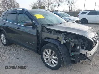 2017 Jeep Cherokee Limited with VIN 1C4PJMDBXHW582616, listed as a IAAI auction lot 41063889 with 125,839 mi miles. Bid and sale history available at carsss.com. Image 1.