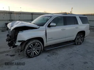 2019 GMC Yukon Denali with VIN 1GKS2CKJ9KR119887, listed as a Copart auction lot 83589544 with 86,754 mi miles and Salvage Title. Bid and sale history available at carsss.com. Image 1.