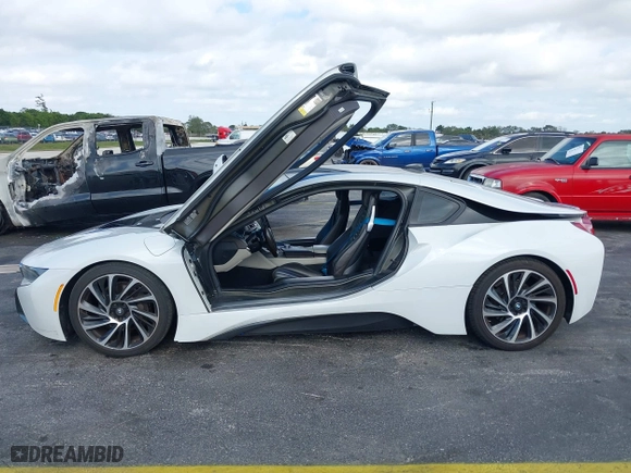 2015 BMW i8 with VIN WBY2Z2C51FV392661, listed as a IAAI auction lot 38409147 with 79,082 mi miles. Bid and sale history available at carsss.com. Image 14.