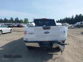 2015 Ford F-150 XLT with VIN 1FTEW1EP4FKE54734, listed as a IAAI auction lot 42137158 with 153,991 mi miles. Bid and sale history available at carsss.com. Image 16.