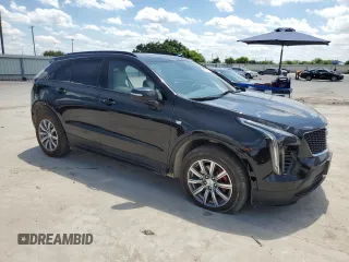 2021 Cadillac XT4 AWD Sport with VIN 1GYFZFR43MF054379, listed as a Copart auction lot 55338315 with 53,693 mi miles and Salvage title. Bid and sale history available at DreamBid. Image 4.