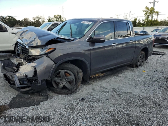2023 Honda Ridgeline RTL-E with VIN 5FPYK3F79PB010418, listed as a Copart auction lot 62272845 with 39,739 mi miles and Salvage title. Bid and sale history available at DreamBid. Image 1.
