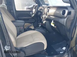 2023 Jeep Gladiator Overland z VIN 1C6HJTFG1PL546604, wystawiony jako IAAI lot #41599632 z przebiegiem 23 108 mil mil oraz . Historia ofert i sprzedaży dostępna na DreamBid. Obrazek 5.