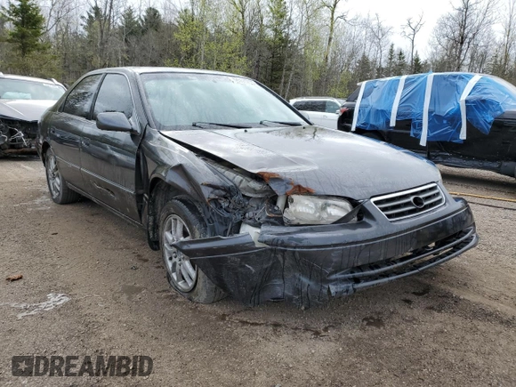 2001 Toyota Camry LE z VIN JT2BF22K010295564, wystawiony jako Copart lot #55111755 z przebiegiem 379 337 mil mil oraz Szkoda całkowita • Salvage title. Historia ofert i sprzedaży dostępna na DreamBid. Obrazek 4.