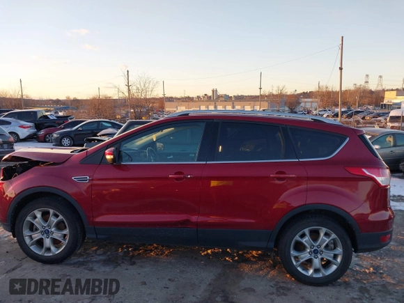 2015 Ford Escape Titanium with VIN 1FMCU9J99FUB34831, listed as a IAAI auction lot 41278305 with 59,658 mi miles and . Bid and sale history available at DreamBid. Image 14.
