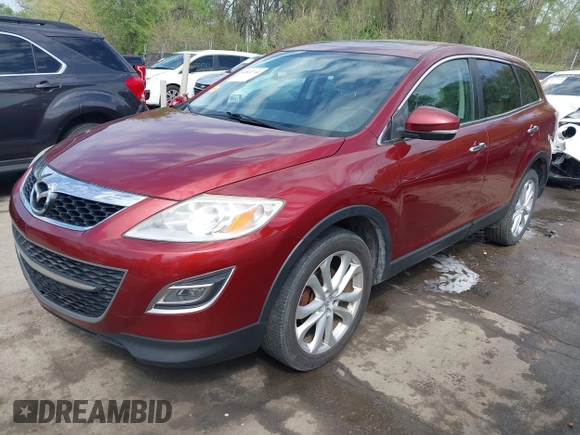 2011 Mazda CX-9 Grand Touring z VIN JM3TB2DA6B0310296, wystawiony jako IAAI lot #42022744 z przebiegiem 163 889 mil mil oraz . Historia ofert i sprzedaży dostępna na DreamBid. Obrazek 2.