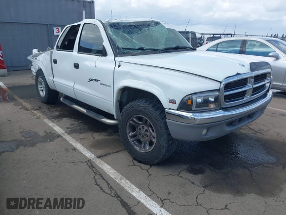 2004 Dodge Dakota SLT with VIN 1D7HG48N14S758614, listed as a IAAI auction lot 41907403 with 242,343 mi miles. Bid and sale history available at carsss.com. Image 1.