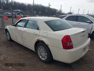 2009 Chrysler 300 LX with VIN 2C3KA43D09H508381, listed as a IAAI auction lot 41834673 with 112,152 mi miles. Bid and sale history available at carsss.com. Image 3.