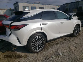 2023 Lexus RX with VIN 2T2BBMCA4PC002053, listed as a Copart auction lot 74194733 with 5,972 mi miles. Bid and sale history available at carsss.com. Image 3.