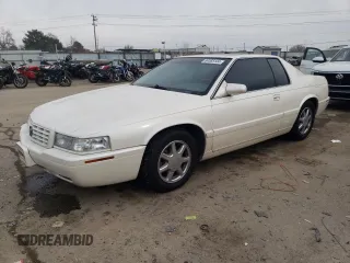 2001 Cadillac Eldorado Touring ETC z VIN 1G6ET12921B103685, wystawiony jako Copart lot #84565144 z przebiegiem 99 265 mil mil oraz Szkoda całkowita • Salvage title. Historia ofert i sprzedaży dostępna na DreamBid. Obrazek 1.
