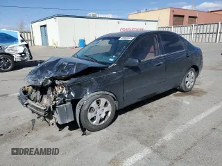 2006 Kia Spectra EX with VIN KNAFE121465331759, listed as a Copart auction lot 48946545 with 114,911 mi miles and Salvage Title. Bid and sale history available at carsss.com. Image 1.