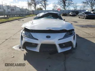 2023 Toyota GR Supra 3.0 with VIN WZ1DB0G01PW055910, listed as a Copart auction lot 44459975 with 0 mi miles and Salvage Title. Bid and sale history available at carsss.com. Image 5.