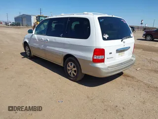 2004 Kia Sedona LX with VIN KNDUP131646596077, listed as a IAAI auction lot 41772025 with 236,282 mi miles. Bid and sale history available at carsss.com. Image 3.