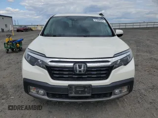 2019 Honda Ridgeline RTL-E with VIN 5FPYK3F74KB039057, listed as a Copart auction lot 57350525 with 105,102 mi miles and Salvage title. Bid and sale history available at DreamBid. Image 5.