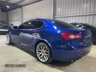 2014 Maserati Ghibli S Q4 z VIN ZAM57RTA0E1087454, wystawiony jako Copart lot #58608995 z przebiegiem 58 880 mil mil oraz Szkody całkowita. Historia ofert i sprzedaży dostępna na DreamBid. Obrazek 3.