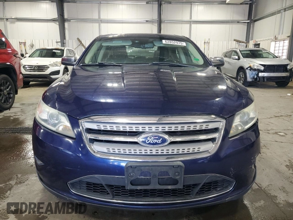 2011 Ford Taurus Limited with VIN 1FAHP2FW2BG136488, listed as a Copart auction lot 62852975 with 216,879 mi miles and Salvage title. Bid and sale history available at DreamBid. Image 5.