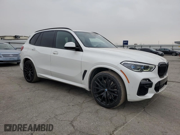 2020 BMW X5 M50i with VIN 5UXJU4C00LL228142, listed as a Copart auction lot 81246294 with 86,014 mi miles and Clean Title. Bid and sale history available at DreamBid. Image 4.