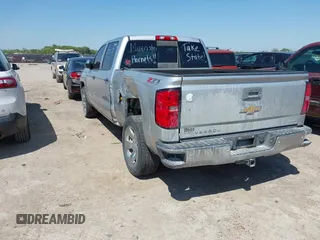 2014 Chevrolet Silverado 1500 LTZ with VIN 3GCUKSEC3EG163562, listed as a IAAI auction lot 41978091 with 166,300 mi miles and . Bid and sale history available at DreamBid. Image 3.