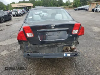 2004 Honda Civic LX with VIN 2HGES16554H543338, listed as a Copart auction lot 56353535 with 60,610 mi miles and Clean Title. Bid and sale history available at DreamBid. Image 6.