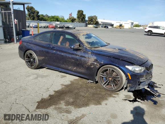 2015 BMW M4 with VIN WBS3R9C50FK335084, listed as a Copart auction lot 61962965 with 142,157 mi miles and Salvage title. Bid and sale history available at DreamBid. Image 4.