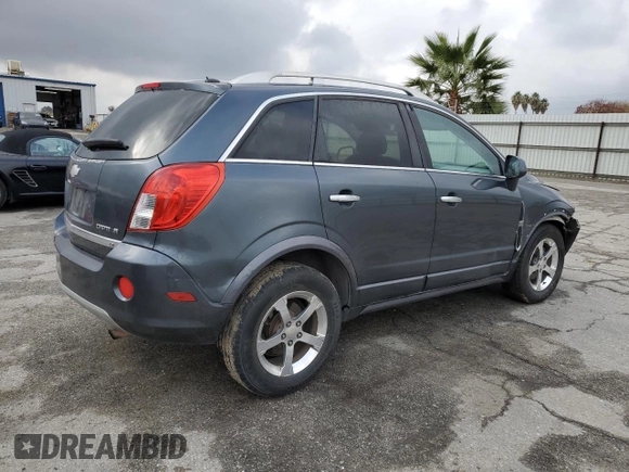 2013 Chevrolet Captiva Sport LT with VIN 3GNAL3EK1DS581084, listed as a Copart auction lot 82809984 with 153,173 mi miles and Salvage Title. Bid and sale history available at DreamBid. Image 3.