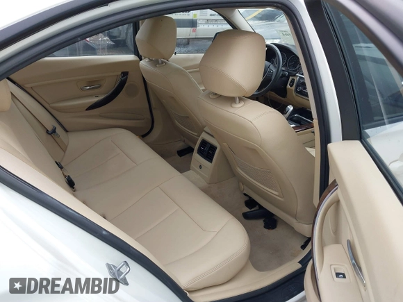 2014 BMW 3 Series 328i xDrive with VIN WBA3B5G50ENS06304, listed as a IAAI auction lot 41402704 with 139,943 mi miles. Bid and sale history available at carsss.com. Image 8.