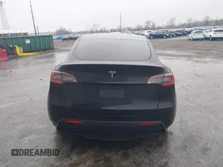 2021 Tesla Model Y Standard Range with VIN 5YJYGDED9MF103989, listed as a IAAI auction lot 41482268 with 33,485 mi miles and . Bid and sale history available at DreamBid. Image 17.