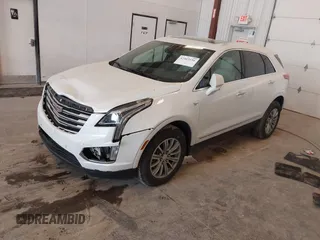 2018 Cadillac XT5 Luxury AWD z VIN 1GYKNDRS9JZ248969, wystawiony jako IAAI lot #42463156 z przebiegiem 90 271 mil mil oraz . Historia ofert i sprzedaży dostępna na DreamBid. Obrazek 17.