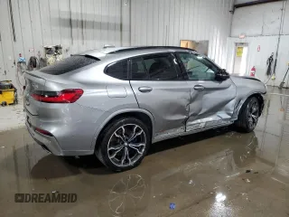 2021 BMW X4 M z VIN 5YMUJ0C05M9E04935, wystawiony jako Copart lot #42149535 z przebiegiem Nie podano mil oraz Szkody całkowita. Historia ofert i sprzedaży dostępna na DreamBid. Obrazek 3.