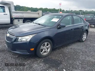 2014 Chevrolet Cruze 1LT with VIN 1G1PC5SB4E7323802, listed as a IAAI auction lot 42746165 with 88,265 mi miles and . Bid and sale history available at DreamBid. Image 2.