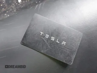 2020 Tesla Model 3 Standard Range Plus with VIN 5YJ3E1EA7LF742973, listed as a IAAI auction lot 41409285 with 48,993 mi miles and . Bid and sale history available at DreamBid. Image 11.